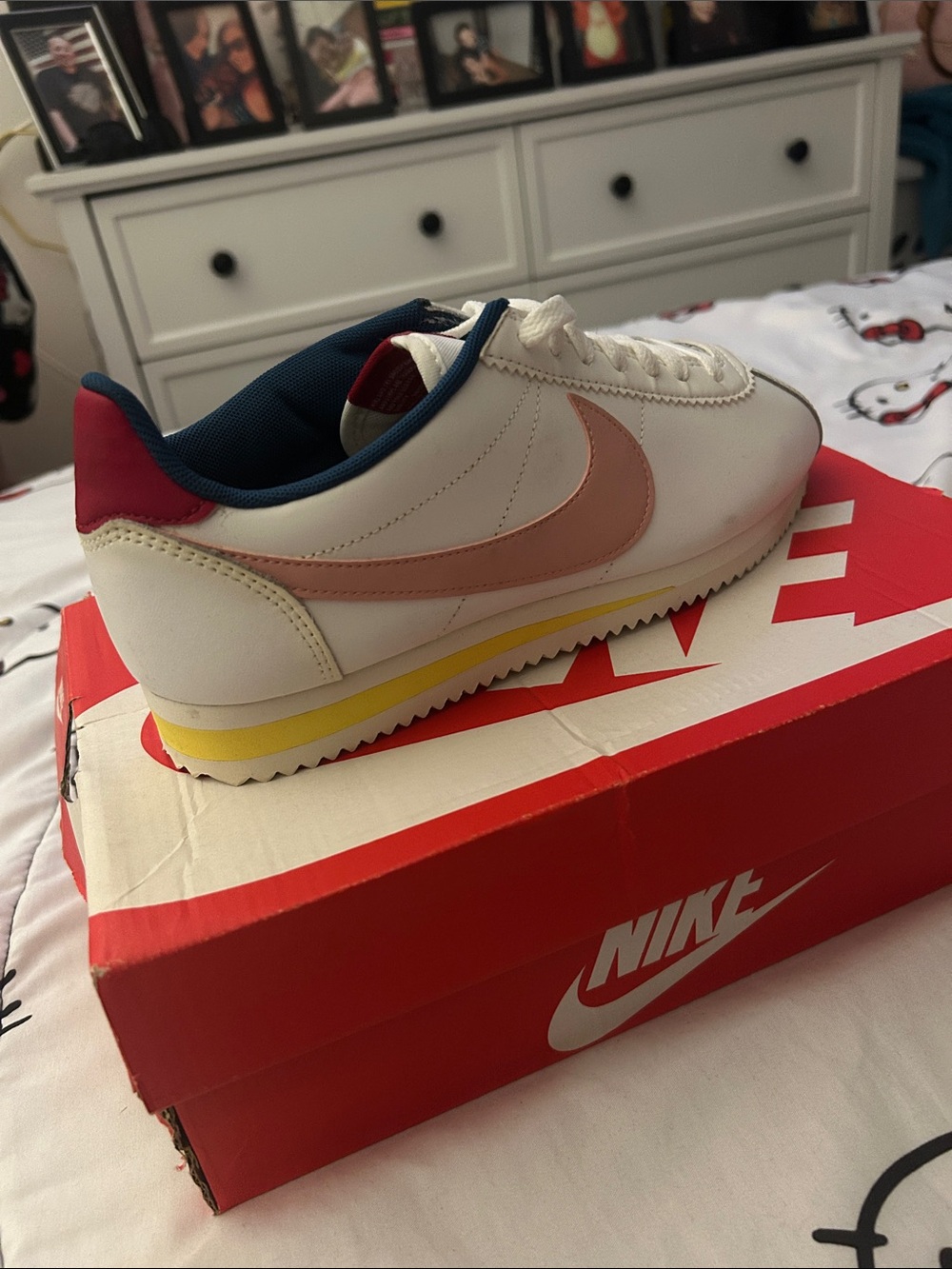 Nike White Sneakers with Pink Swoosh and Yellow Midsole